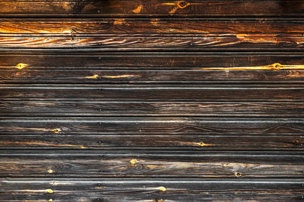 istock Wood wall background. Old wooden texture. Top view. 1290565775
