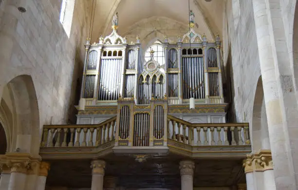 Alba-Iulia, Romania - 10.11.2020: A large organ with pipes inside a Catholic cathedral