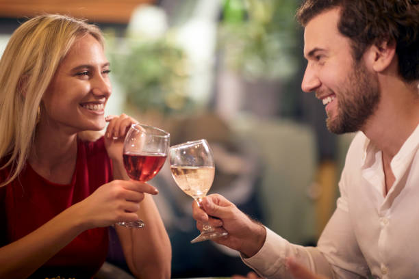 istock Cheerful couple on a romantic date together having a special moment 1290568580