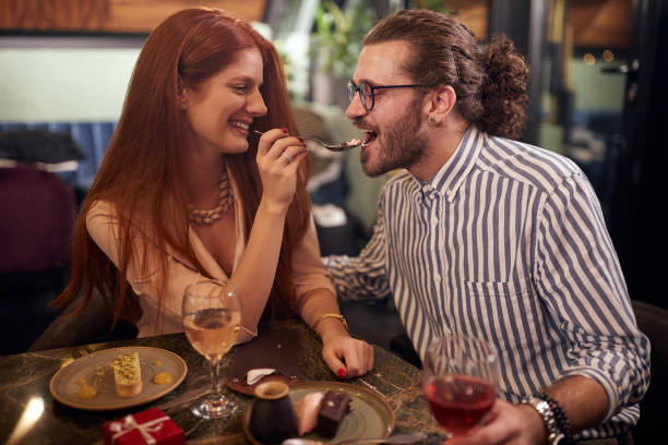 istock Happy couple on a dinner together 1290570038