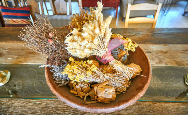 Dried flower arrangement in a vintage case
