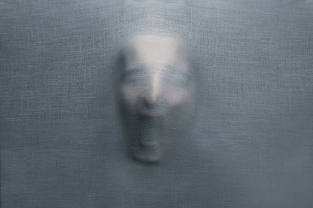 istock Soundless screaming face on cloth 1290572763