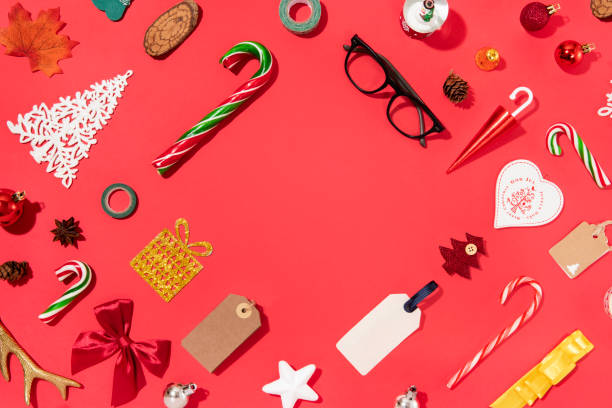 istock Christmas Decoration with Objects and Ornaments on Red Background 1290573835