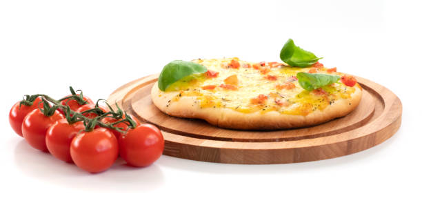 istock Pizza with cheese and tomatoes  isolated on white background 1290573854