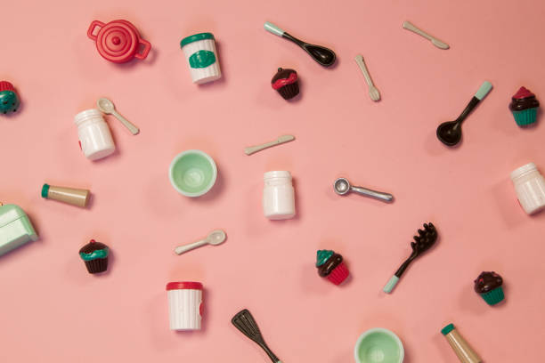 istock flat lay image of plastic toy tableware with cakes on pastel pink background 1290576513