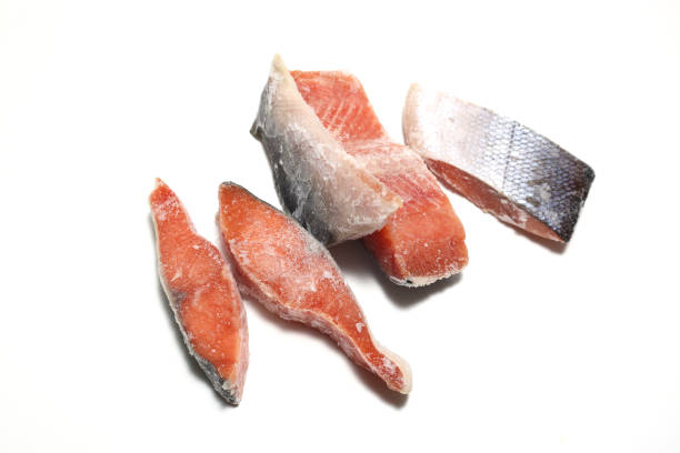 istock frozen salmon fillets in a white background 1290578916