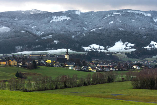 istock Small beautiful austrian village surrounded by mountains in Ennstal, Steiermark, Austria 1290579835