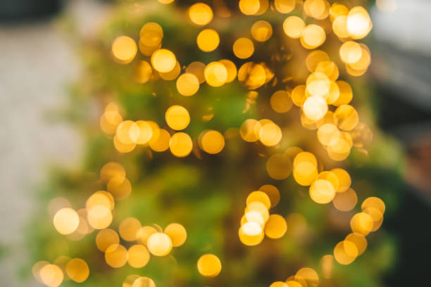 istock Abstract background with golden glitter bokeh lights 1290581276
