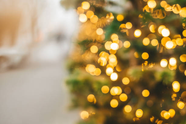 istock Abstract background with golden glitter bokeh lights 1290581382