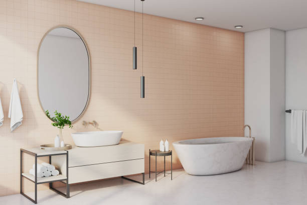 istock Freestanding bath with mirror in comfortable bathroom. 1290582730