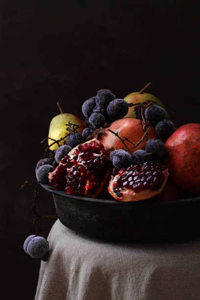 istock Rustic Still Life Fruits Black Background 1290584957
