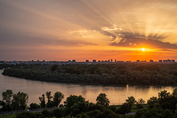 istock Sunset over city and rivers 1290585307