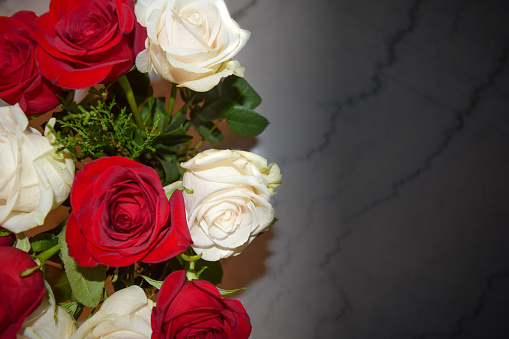 Red & White Bouquet of Roses on White Marble with Text Room for Valentine & Anniversary Day