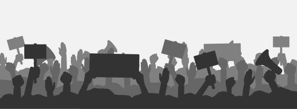 Crowd of people protesters. Silhouettes of protesting people with banners, megaphones and raised up hands and fist. Concept of fight for your rights, revolution or protest. Vector Crowd of people protesters. Silhouettes of protesting people with banners, megaphones and raised up hands and fist. Concept of fight for your rights, revolution or protest. Vector illustration. megaphone silhouettes stock illustrations