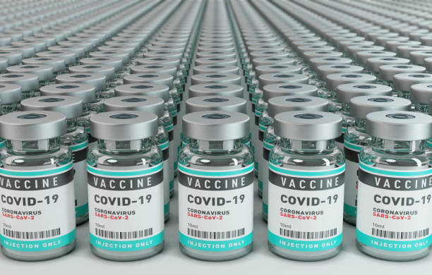 ワクチンcovid-19コロナウイルス概念ボトルバイアルの大規模なグループ. - vial capsule pill nobody ストックフォトと画像