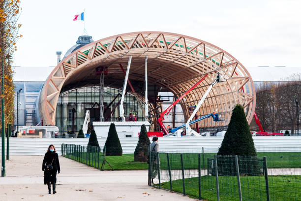 The Grand Palais Éphémère (Provisional Grand Palais), a temporary building designed by the architect Jean-Michel Wilmotte and built by the company GL events, will be installed on the Champ-de-Mars at the start of 2021 until the end of the Olympic Games and Paralympics Paris 2024. During the works of the Grand Palais, it will host the prestigious events usually hosted in the Nave. These events, such as the FIAC, the Saut Hermès and many other events, will contribute to the cultural influence of Paris and France. Preparations for the assembly of the Grand Palais Éphémère began on July 15, 2020 on the Joffre plateau in Champ-de-Mars. Paris in France, December 10, 2020.