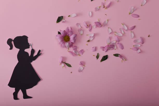 istock girl with flowers 1290595494