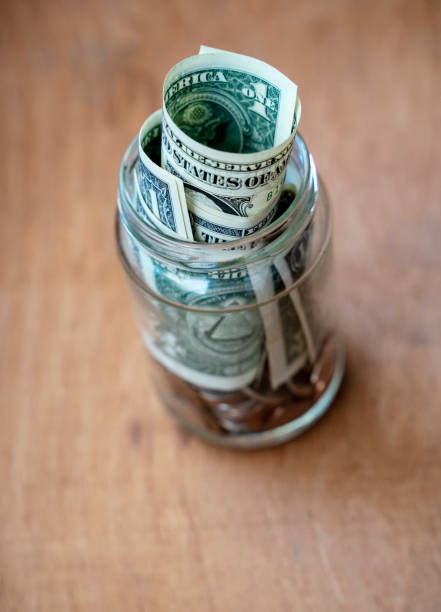 istock US dollars in the jar Saving money concept 1290595624