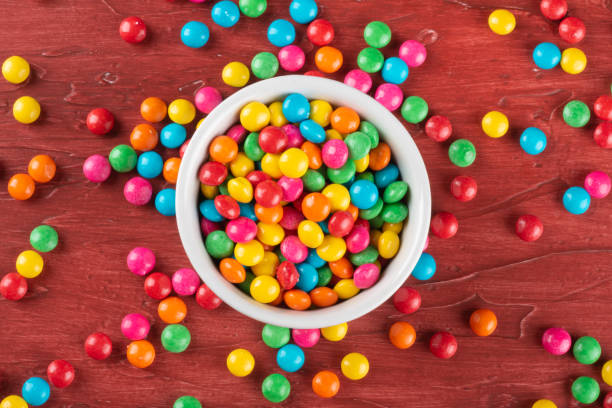istock Colorful Confetti candy in bowl on the table. 1290598276