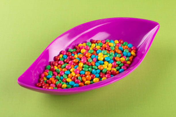 istock Colorful Confetti candy in bowl on the table. 1290598328