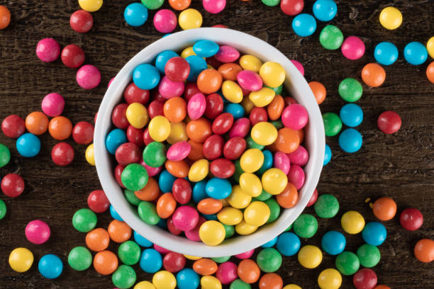 istock Colorful Confetti candy in bowl on the table. 1290598847