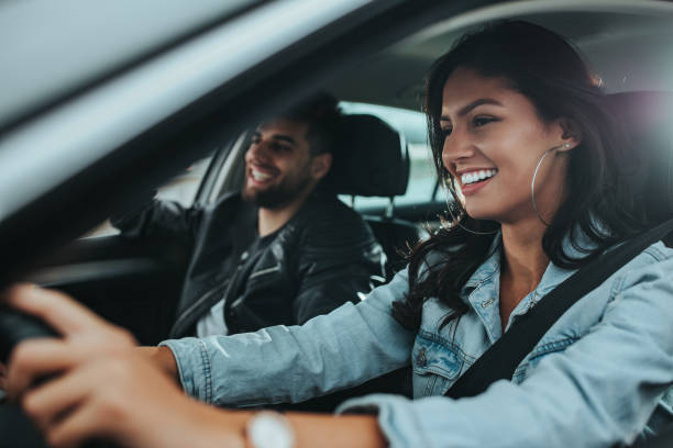 istock Young happy couple going on a road trip by car 1290599199