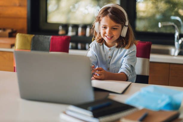 istock Young girl homeschooling 1290601116