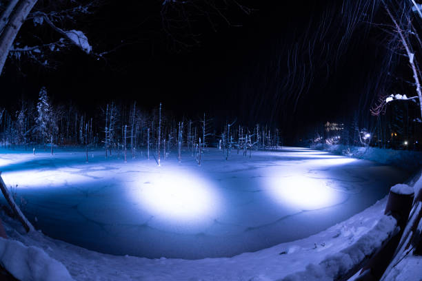 istock Illuminated snow-covered lake at night in Biei 1290608444