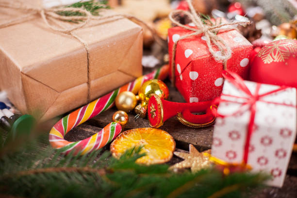 istock Handmade wrapped christmas gift boxes on celebrate background. 1290613912