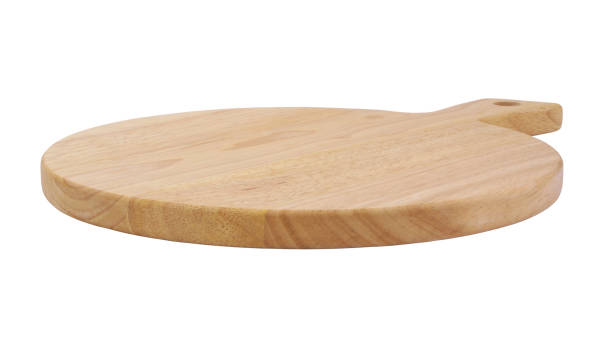 istock Round wooden kitchen board isolated on white 1290630891
