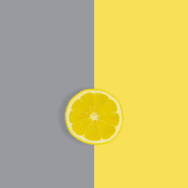 istock slice of lemon on a yellow-grey background 1290633529