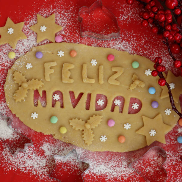 istock Feliz Navidad.Cookie dough letters on wooden table 1290641787