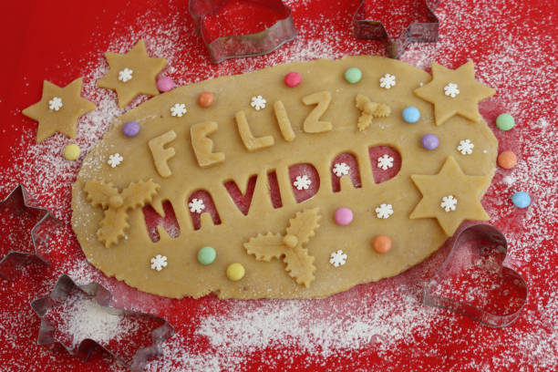 istock Feliz Navidad.Cookie dough letters on wooden table 1290641812