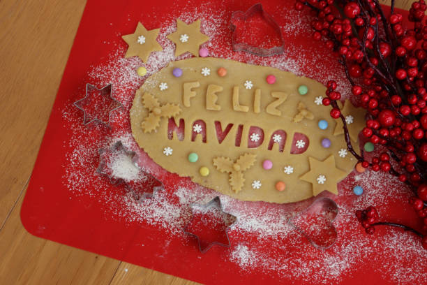 istock Feliz Navidad.Cookie dough letters on wooden table 1290641838