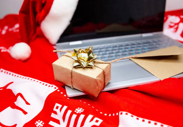 istock Xmas presents. Fast, efficient online shopping and credit card 1290641853