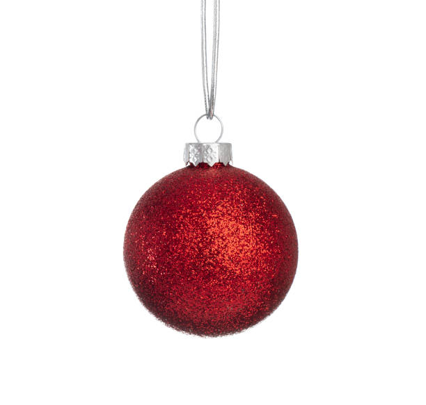 istock Red christmas ball hanging isolated on white background 1290642800