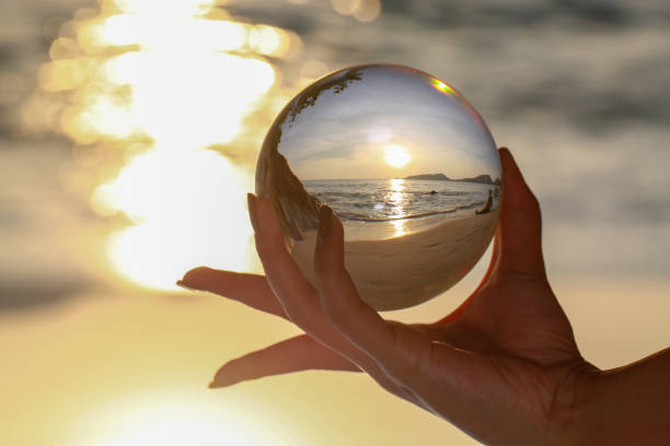 istock Catch the crystal ball with her finger 1290645810