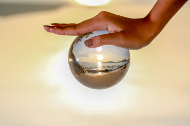 istock Catch the crystal ball with her finger 1290645811