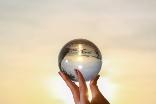 istock Catch the crystal ball with her finger 1290645814