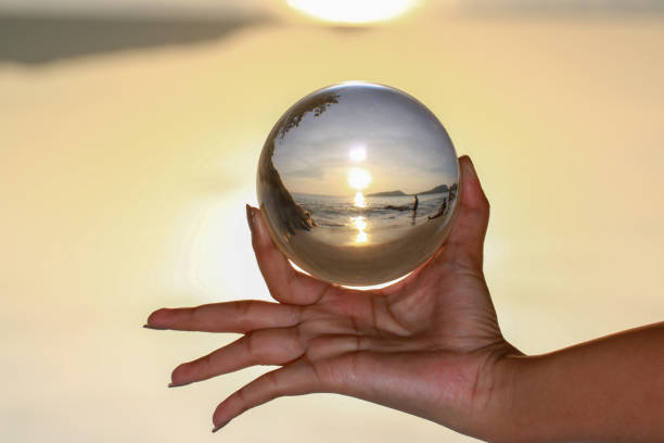 istock Catch the crystal ball with her finger 1290645827