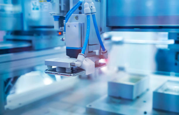 istock intelligence machine working with mobile phone,Smart factory industry 4.0 concept. 1290648202