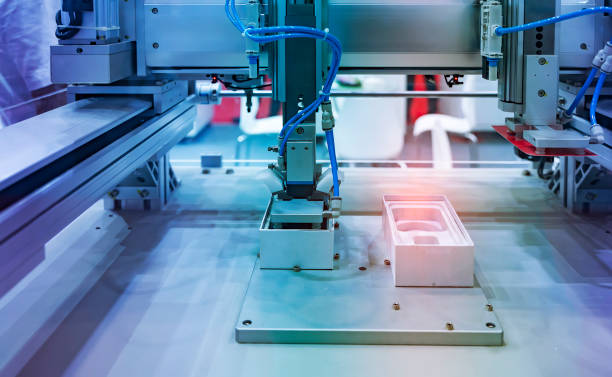 istock intelligence machine working with mobile phone,Smart factory industry 4.0 concept. 1290648209