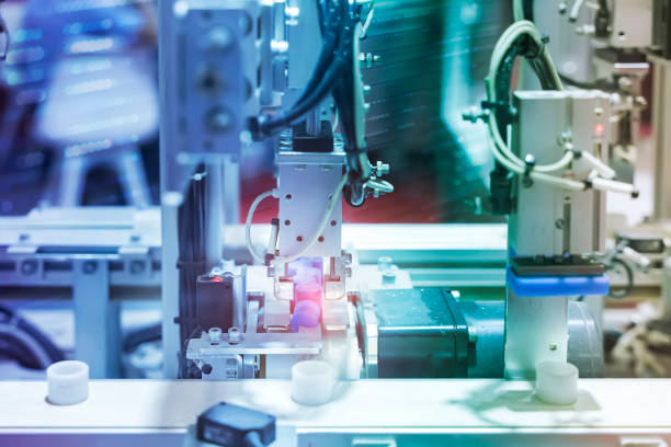istock automatic gripping and smart robot working,industry 4.0 and technology. 1290648224