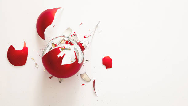istock Red Christmas ball broken isolated on white background, closeup view 1290648261