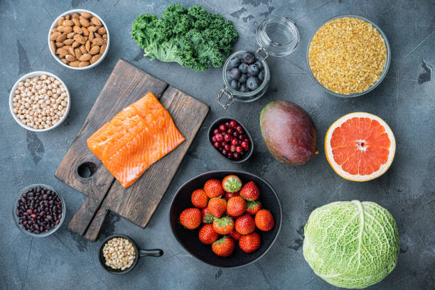 istock Healthy balanced dieting food concept, flat lay, on grey background 1290648416