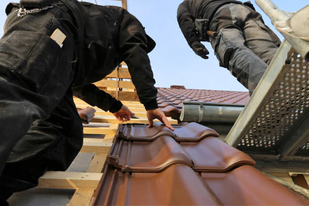 istock Roofing work, new covering of a tiled roof 1290649576