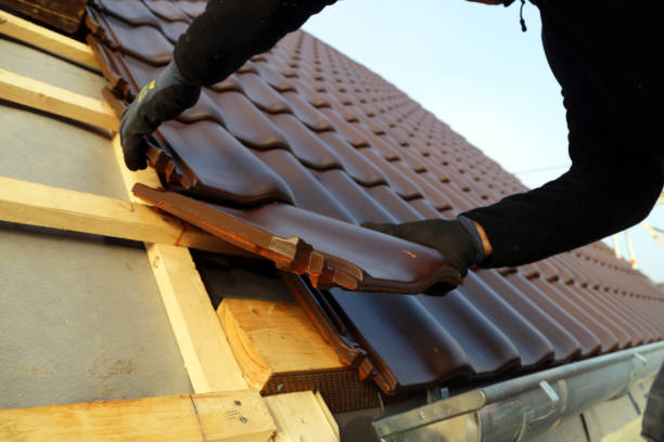 istock Roofing work, new covering of a tiled roof 1290649585