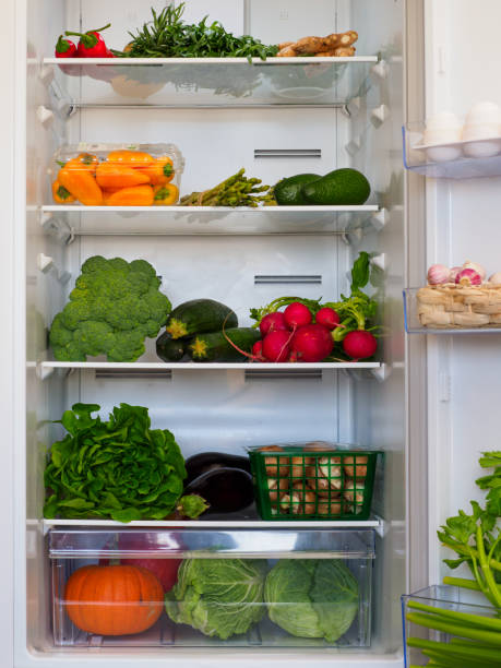 istock Fresh vegetables in household refrigerator. 1290654005