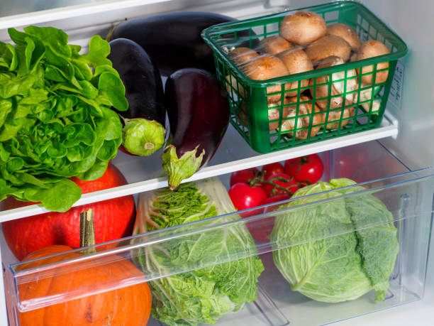 istock Fresh vegetables in household refrigerator. 1290654019