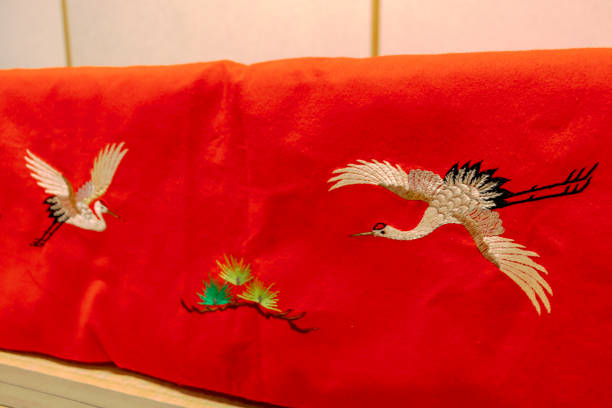 istock Table covered with Japanese traditional red felt 1290654497